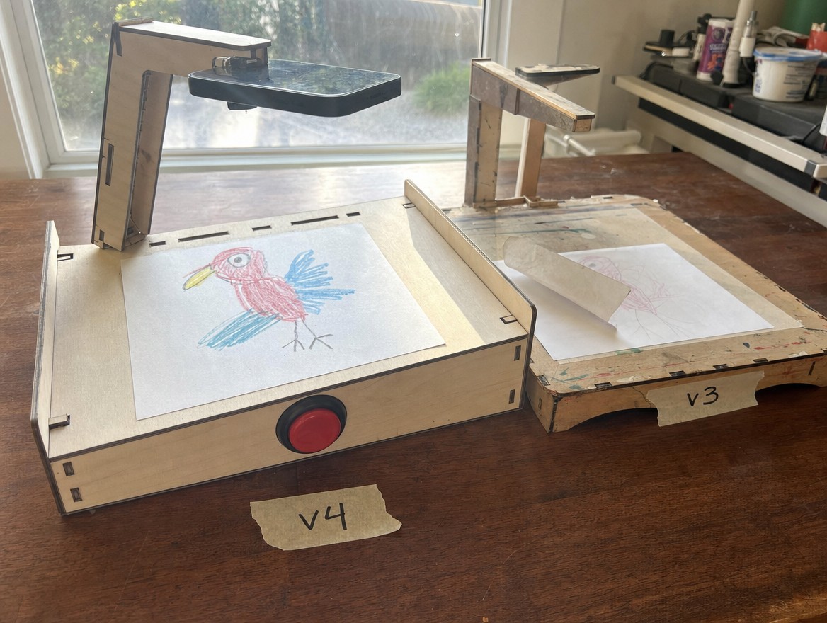 Laser-cut plywood scan tray with red arcade button
